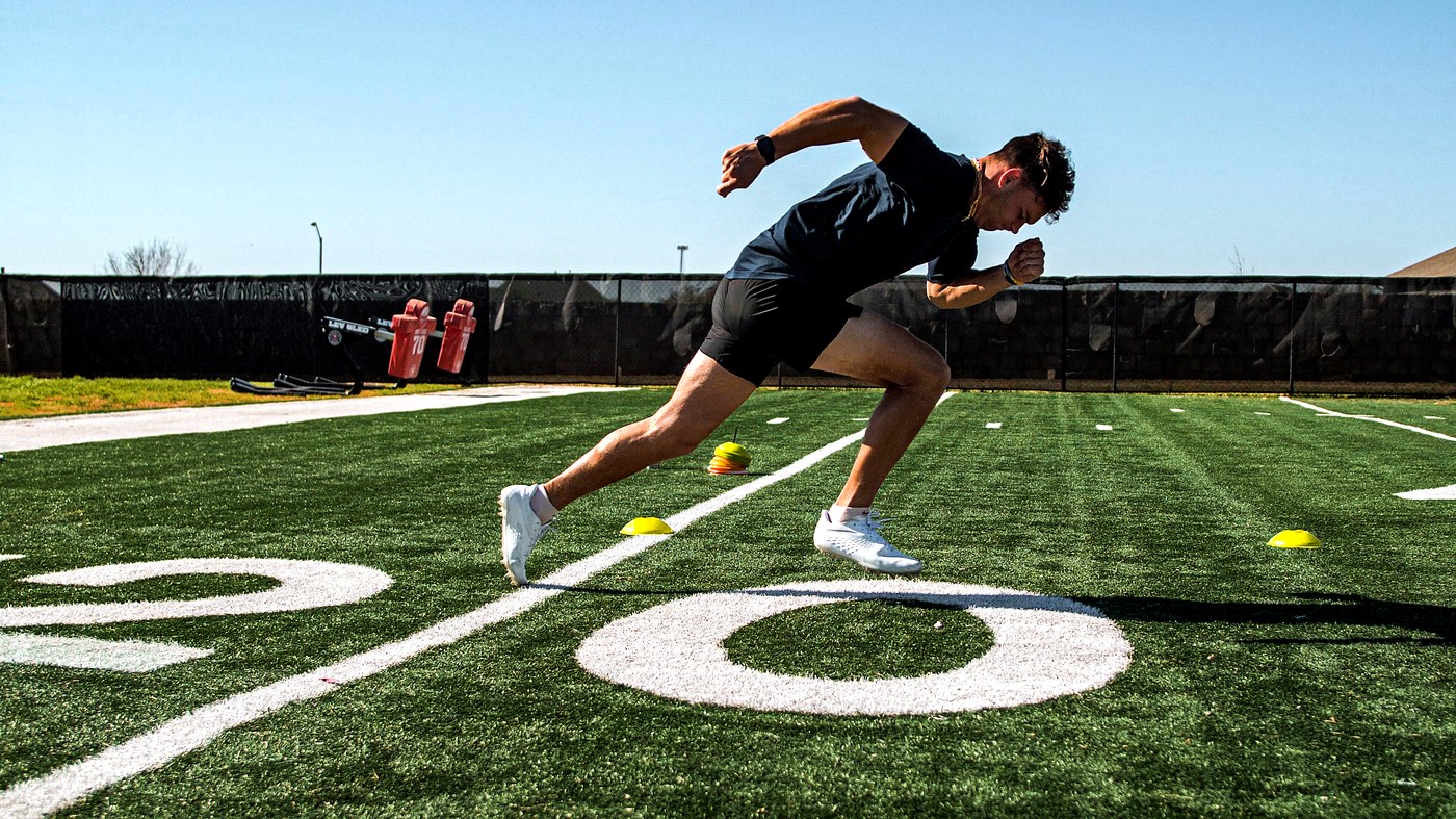 Athlete sprinting during speed training at Sacrifice Training